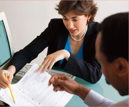 Accountant explaining a form to a client
