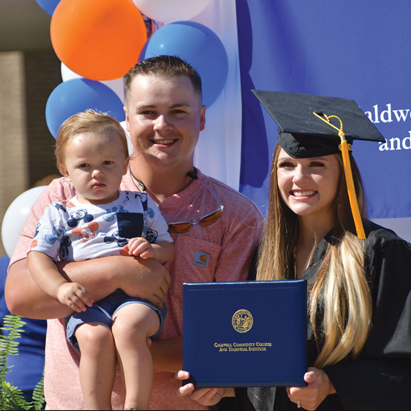 Student at Graduation with her family