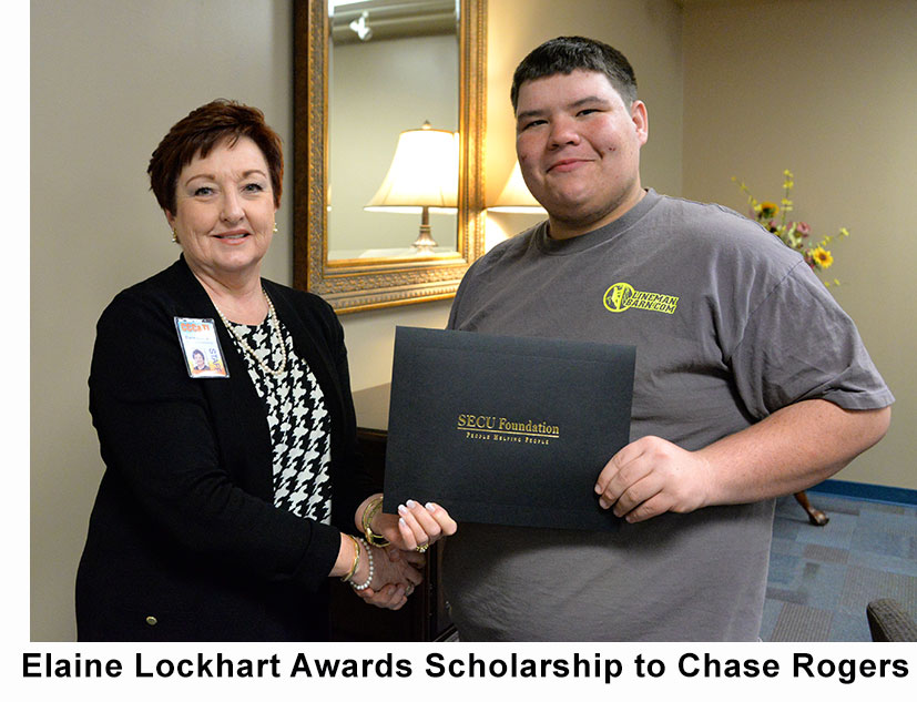 Elain Lockhart awarding scholarship to Chase Rogers
