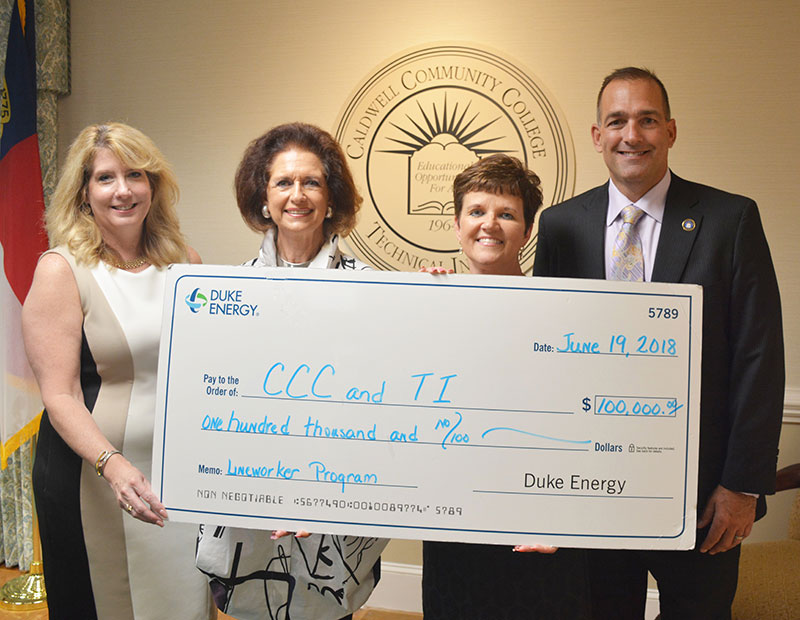 CCC&TI accepting Grant Check from Duke Power