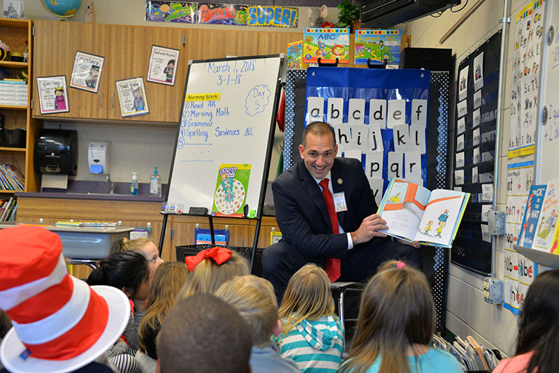 Dr. Mark Poarch Reading to Students