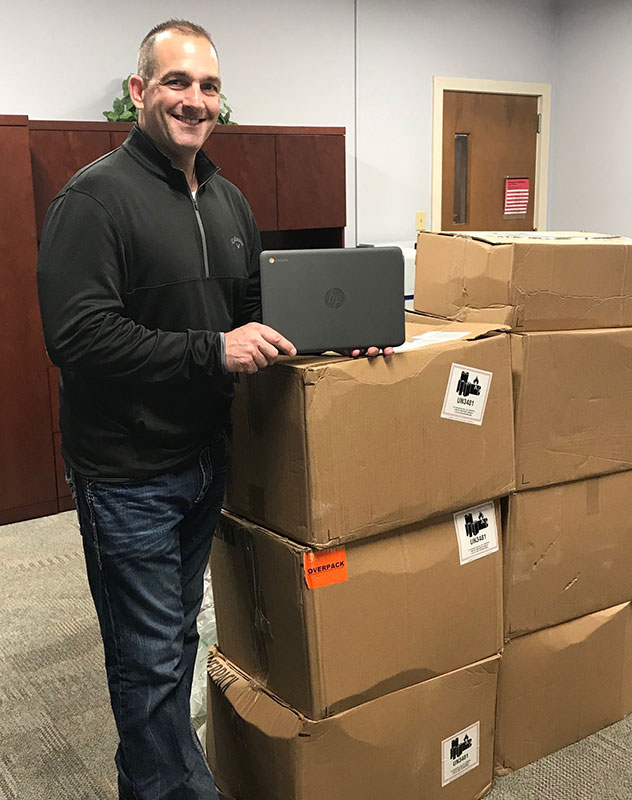 Dr. Poarch with Chrome book donation from Google